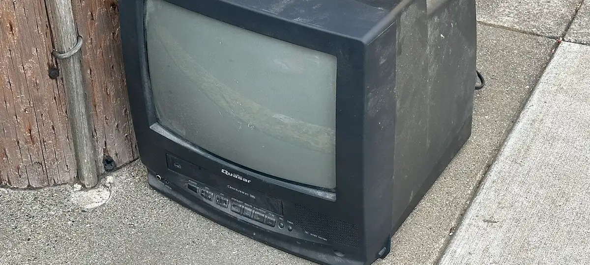 Quasar VV-1303A television set seen discarded in front of Presidio Middle School in San Francisco, California (out of frame)