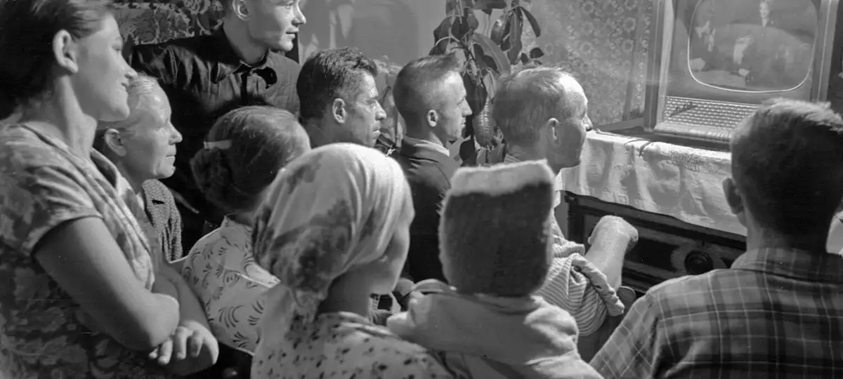 The family and neighbors of the tractor driver of the collective farm "Zhovten" of the Maryinsky district of Stalin's Stalin (now 